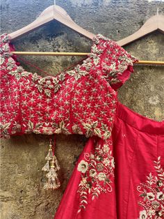 This gorgeous red raw silk bridal lehenga with zardosi and sequins work butti is teamed with a red heavy cutwork blouse. This outfit is completed with a red organza embroidered dupatta.
*Ready to ship in sizes XS, S, M, L Red Gown With Intricate Embroidery And Traditional Drape, Red Chanderi Lehenga With Intricate Embroidery, Anarkali Sets With Intricate Embroidery In Red, Red Embroidered Dola Silk Gown, Red Silk Thread Lehenga For Navratri, Red Dola Silk Gown With Dupatta, Designer Red Gown With Intricate Embroidery, Embroidered Red Dola Silk Gown, Red Silk Lehenga For Navratri