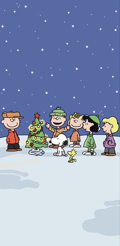 a group of cartoon characters standing in the snow with a christmas tree and stars behind them