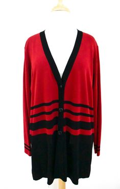 Exclusively Misook red & black v-neck cardigan sweater. Faux pockets. 6 1/4" slits at side seams. 100% acrylic. Very good condition. Size Medium. Garment measurements-- bust: 48" shoulder width: 15 3/4" sleeve length measured from top of sleeves: 24 1/4" hips: 50" front length from top of shoulder at neckline, measured straight down: 29 1/2" Classic Striped Winter Cardigan, Striped V-neck Sweater For Fall, Casual Striped V-neck Cardigan, Winter Striped Cardigan, Striped Long Sleeve Cardigan For Layering, Classic Long Sleeve Sweater With Contrast Stripes, Winter Striped V-neck Sweater With Long Sleeves, Winter Striped Long Sleeve V-neck Sweater, Winter Striped V-neck Long Sleeve Sweater