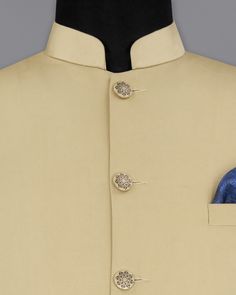 Sleek, suave, and undeniably stylish - the Pavlova Cream Premium Cotton Bandhgala Nehru Jacket is here to redefine your fashion game. Get ready to exude confidence and turn every occasion into your runway. Crafted with a luxurious blend of comfort and sophistication, this suave ensemble has some royal features like - golden button detailing, a tailored regular fit, and bandhgala collar. Channel your inner fashion maven and make heads turn on any occasion! In addition to being constructed from Im Semi-formal Classic Nehru Jacket With Stand Collar, Beige Stand Collar Blazer, Elegant Nehru Jacket With Button Closure For Festive Season, Elegant Nehru Jacket For Semi-formal Winter Occasions, Tailored Festive Semi-formal Outerwear, Tailored Festive Outerwear For Semi-formal Occasions, Semi-formal Winter Nehru Jacket With Button Closure, Elegant Semi-formal Nehru Jacket For Winter, Beige Long Sleeve Nehru Jacket For Formal Occasions