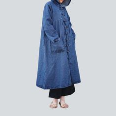 Make a fashion statement with the 2023 Spring-Summer Collection's one-of-a-kind Chinese-style hooded denim coat. inspired by the 90s!Why You'll Fall In LoveThis long. medium wash. buttoned closure coat is designed to bring you the best of both worlds - the signature flair of the 90s. and the modern sensibilities of today. Every stitch is crafted to perfection. promising to take your look to the next level.Unmissable Highlights: 90s Inspired: Embrace the iconic fashion scene of the 90s with this Hooded Denim Blue Jacket For Winter, Hooded Dark Wash Cotton Denim Jacket, Hooded Dark Wash Denim Jacket, Casual Denim Hooded Jacket For Fall, Blue Hooded Denim Jacket With Pockets, Trendy Baggy Outerwear For Fall, Trendy Oversized Hooded Denim Jacket, Oversized Hooded Denim Jacket, Oversized Hooded Denim Jacket With Pockets