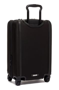 A smart, four-wheel carry-on is shaped from tough FXT ballistic nylon that provides long-wearing durability whether you’re traveling overnight or internationally. Swiveling, easy-to-maneuver wheels offer multidirectional navigation, while smart bumper guards and a patented impact-resistant, X-Brace telescoping-handle system complete the virtually damage-proof design. A built-in USB port helps you stay connected, and a zipper-to-zipper expansion lets you expand the packing space up to two inches. Black Luggage For Business Trips, Black Nylon Luggage For Trips, Classic Black Cases For Trip, Classic Nylon Luggage With Sleeve, Luxury Nylon Luggage With Luggage Sleeve, Modern Black Nylon Luggage, Luxury Nylon Luggage With Sleeve, Classic Rectangular Nylon Luggage, Luxury Nylon Rectangular Luggage