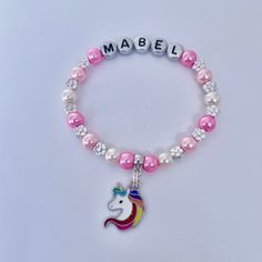 Soooo cute, personalised bracelet complete with a magical silver UNICORN, Rainbow unicorn or Unicorn head charm or a plain little HEART or little STAR charm, silver hearts or silver flowers with the NAME & COLOUR/COLOURS (inc rainbow) of your choice at a SUPERB PRICE (limited time only). All bracelets are designed and made to order. Perfect gifts for friends at a birthday party. All bracelets are sent out in a pretty organza gift bag with an attached blank heart shaped tag for your personal mess Personalised Bracelet, Heart Gift Tags, Unicorn Charm, Unicorn Head, Unicorn Rainbow, Personalized Bracelets, Heart Gifts, Bag Tag, Rainbow Unicorn