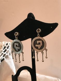 "Lovely, vintage Los Ballesteros earrings, with an early mark, Iguala, instead of Taxco, and double B. The rest of the mark is illegible. The errings are 1 5/8\" long and 7/8\" wide. They are screw back, and in excellent, vintage condition." Vintage Sterling Silver Dangle Plug Earrings, Vintage Sterling Silver Chandelier Earrings, Vintage Sterling Silver Chandelier Drop Earrings, Vintage Sterling Silver Drop Plug Earrings, Vintage Sterling Silver Drop Earrings, Vintage Silver Round Chandelier Earrings, Collectible Vintage Dangle Earrings, Vintage Hallmarked Dangle Earrings, Vintage Sterling Silver Pierced Plug Earrings