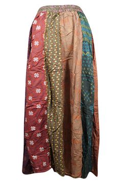 Handmade Womens Maxi Fall Skirt, Handmade Long Patchwork Retro Flared Skirts S/M/L adorned with an array of eclectic prints, including abstract, solid, striped, and floral motifs, all beautifully presented on a soft, breathable rayon fabric. This skirt exudes charm and versatility.These vertical panels are adorned with a thick "dori," extending from the waist down to the hem, resulting in a festive boho aesthetic.This long skirt features a accordion pleat design that commences with a narrower wa Red Long Hippie Skirt, Multicolor Patchwork Flowy Skirt, Multicolor Harem Skirt, Relaxed Multicolor Patchwork Skirt, Bohemian Red Skirt With Patchwork, Multicolor Patchwork Skirt, Eclectic Prints, Fall Skirt, Flared Skirts