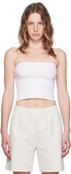 Stretch cotton jersey tube top. · Straight neck · Converts to skirt Supplier color: White Stretch Cotton Summer Tube Top, Trendy Stretch Cotton Tube Top, Stretch Cotton Tube Top For Summer, Versatile Fitted Tube Top For Spring, Trendy Strapless Elastane Tops, Stretch Cotton Tube Top For Spring, Versatile Stretch Tube Top For Spring, Spring Cotton Stretch Tube Top, Versatile Cotton Tube Top For Spring