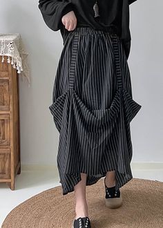 Fitted Black Asymmetrical Striped Cotton Skirts SummerFabric: Cotton BlendedSize & Fit: This garment fits true to size.Length: Size 2XL measures 31.2"from waist to hem.Waist:Fitted - elastic waist allows stretch Hip: Loosely Fitted. room for hips. Hand Wash Cold.