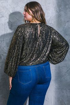 A sequin top featuring round neckline, long sleeve, elasticized waist and back neck button closure. Perfect for my plus size girly wanting a trendy options . Trendy Sequined Blouse For Party Season, Stretch Long Sleeve Crew Neck Top For Party, Long Sleeve Tops With Contrast Sequin For Night Out, Contrast Sequin Long Sleeve Tops For Night Out, Fall Contrast Sequin Crew Neck Top, Fall Crew Neck Top With Contrast Sequin, Trendy Sequined Blouse For Fall, Trendy Fall Blouse With Sequins, Glamorous Long Sleeve Tops With Contrast Sequin