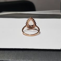 14k solid rose gold natural pear shaped morganite gemstone and natural round brilliant cut shaped diamonds gemstones ring. 1. The weight of natural morganite gemstone used in the ring =3.00 cts. 2. The weight of natural diamonds gemstones used in the ring =0.60 cts. 3. The weight of 14k solid rose gold used in the ring =3.260 grms. 4. The design of the ring is absolutely stunning and gorgeous. 5. I have used all my skills and experience to manufacture this ring as beautiful as I can and I do hop Pear-shaped Morganite Jewelry, Rose Gold Pear-shaped Diamond Ring With Prong Setting, Formal Rose Gold Pear-shaped Diamond Ring, Morganite Pear-shaped Fine Jewelry Ring, Rose Gold Pear-shaped Jewelry With Rose Cut Diamonds, Rose Gold Pear-shaped Rose Cut Diamond Jewelry, Pear-shaped Rose Gold Jewelry With Rose Cut Diamonds, Pear-shaped Morganite Ring With Prong Setting, Rose Gold Diamond Teardrop Ring