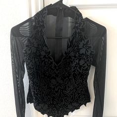 Nwt Tadashi Black Sheer/Beaded Long Sleeve Evening Blouse. Never Been Worn Size S Sheer Fitted V-neck Blouse, Festive Black V-neck Top, Fitted Mesh Top With Lace Detail For Party, Fitted Lace Mesh Top For Party, Fitted Mesh Top With Lace For Party, Elegant Festive Sheer Blouse, Sheer V-neck Top For Formal Occasions, Fitted V-neck Sheer Mesh Top, Sheer Sleeves V-neck Blouse For Party