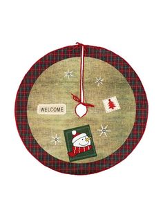 a christmas themed clock hanging on the wall