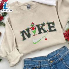 Merry Christmas Grinch Christmas Snow Vintage Grinch Christmas Embroidered Shirt An embroidered sweatshirt is a cozy and stylish piece of clothing, typically made from soft cotton or fleece. It features intricate embroidered designs, adding a personal and artistic touch. These designs can range from simple logos or text to more detailed patterns, making each sweatshirt unique. Perfect for casual wear, embroidered sweatshirts combine comfort with a creative flair, suitable for everyday use or as Vintage Grinch, Nike Christmas, Christmas Sweatshirt Ideas, Grinch Stuff, Preppy Christmas, Cute Shirt Designs, School Looks, Grinch Christmas, Christmas Hoodies