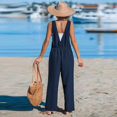 Indulge in sleek simplicity with our Navy Square Neck Straight Leg Jumpsuit. Designed with a square neckline and straight leg silhouette, this jumpsuit offers timeless style. Product code: CAA13E4B018JJ,CAA13E4B018PP Beach Overalls And Rompers In Solid Color, Chic Navy Sleeveless Jumpsuits And Rompers, Elegant Beach Jumpsuits And Rompers, Navy Jumpsuits And Rompers For Work In Summer, Navy Summer Overall Jumpsuit, Chic Navy Jumpsuits And Rompers For Summer, Baggy Jumpsuit, Cargo Jumpsuit, Peasant Sleeve