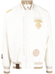 white/beige embroidered logo at the chest all-over motif embroidery baseball collar stripe detailing front press-stud fastening two front welt pockets ribbed cuffs and hem long sleeves White Varsity Jacket With Baseball Collar For Fall, White Cotton Varsity Jacket With Long Sleeves, White Cotton Varsity Jacket With Baseball Collar, White Cotton Varsity Jacket For Fall, White Varsity Outerwear With Embroidered Logo, White Varsity Cotton Outerwear, White Casual Varsity Jacket With Baseball Collar, White Cotton Varsity Outerwear, White Varsity Jacket With Button Closure