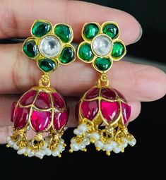 High-quality Jadau Kundan Jhumkas with Pearl tassels. Brass-based item.  Hand made. Traditional Jhumkas For Eid Celebration, Traditional Chandbalis With Latkans For Celebrations, Festive Dangle Jhumkas With Tilla, Dangle Jhumkas For Diwali Festivities, Temple Jewelry Jhumkas With Latkans For Celebrations, Festive Dangle Jhumkas For Diwali, Traditional Tilla Jhumkas For Eid, Traditional Cutdana Jhumkas For Eid, Traditional Festive Danglers With Latkans