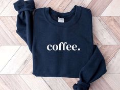 Introducing our Coffee Lover Embroidered Sweatshirt, the perfect blend of comfort, style, and passion for all coffee enthusiasts out there! Designed for both men and women, this 2D Crewneck Sweatshirt is a must-have addition to your wardrobe. Our sweatshirt features a meticulously embroidered coffee lover design, showcasing your love for that rich aroma and bold flavor. Crafted with utmost attention to detail, each stitch exudes the essence of a perfectly brewed cup of coffee, making it a unique Black Casual Sweatshirt Gift, Casual Long Sleeve Coffee T-shirt, Coffee Color Crew Neck Top, Coffee-colored Relaxed Fit Sweatshirt With Letter Print, Coffee Long Sleeve T-shirt With Letter Print, Coffee Colored Relaxed Fit Sweatshirt With Letter Print, Relaxed Fit Coffee Sweatshirt With Letter Print, Casual Coffee Long Sleeve Sweatshirt, Casual Long Sleeve Coffee Sweatshirt