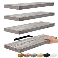 three shelves with different types of wood and metal brackets on each shelf, one being held up by a hand