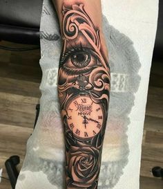 a person with a clock tattoo on their arm