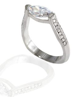 a white gold ring with an oval shaped diamond set in the center and side stones