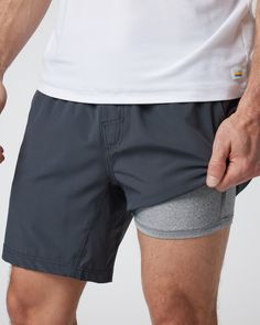 One short for every sport, the Kore Shorts have a classic athletic fit, falling just above the knee with an anywhere and everywhere versatility. Go commando in confidence with the breathable, boxer-brief liner. | Vuori Kore Shorts | Charcoal | Large Vuori makes premium performance apparel inspired by the active Coastal California lifestyle; an integration of fitness, surf, sport, and art. Breaking down the boundaries of traditional activewear, we are a new perspective on performance apparel. Athleisure Boxer Briefs With Built-in Shorts For Running, Gray Sporty Activewear With Built-in Shorts, Sporty Boxer Briefs With Elastic Waistband For Workout, Sporty Boxer Briefs For Workout With Elastic Waistband, Sporty Gray Boxer Briefs For Workout, Gray Moisture-wicking Boxer Briefs For Workout, Sports Nylon Boxer Briefs With Built-in Shorts, Nylon Sports Boxer Briefs With Built-in Shorts, Sporty Boxer Briefs With Comfort Waistband