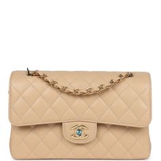 This small classic double flap bag is in beige caviar leather with gold tone hardware and features a front flap with signature CC turnlock closure, half moon back pocket, and adjustable interwoven gold tone chain link and beige leather shoulder strap.The interior is lined in beige leather with the "love letter" zipper compartment underneath the first flap, an "outer" slit pocket under the second flap, and an interior compartment with two open pockets separated by a "lipstick" compartment.Collect Classic Flap Bag, Burberry Shoes, Sneaker Jewelry, Bottega Veneta Shoulder Bag, Handbag Wallet, Carry All Bag, Wallet Accessories, Classic Flap, Flap Bag