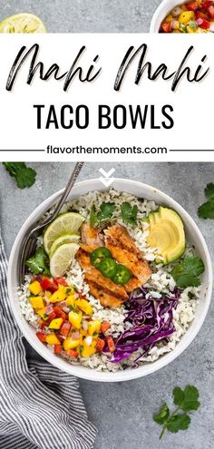 a bowl filled with chicken, rice and veggies on top of a table