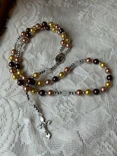 Hand beaded rosary made from high quality plastic beads Beaded Brown Rosary Gift, Brown Beaded Rosary Gift, Brown Beaded Rosary As Gift, Colorful Beads Rosary As Gift, Beaded Rosary With Oval Beads As Gift, Gift Beaded Rosary, Multicolor Beaded Rosary As Gift, Multicolor 8mm Beads Rosary As Gift, Multicolor Rosary With 8mm Beads As Gift