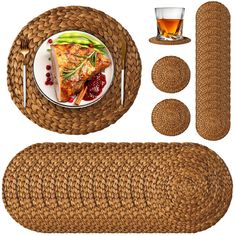 there is a place setting with food and drinks on the plate, next to it's mat