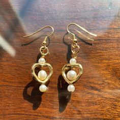 🍃these earrings are made with freshwater pearls & gold plated heart beads 🍃these earrings contain high quality gold plated earring hooks, with gold plated loops holding the beads in place. earrings measure 2 inches in height. Gold Dangle Pearl Earrings For Valentine's Day, Gold Pearl Earrings For Valentine's Day, Valentine's Day Gold Pearl Earrings For Anniversary, Gold Pearl Earrings For Anniversary On Valentine's Day, Gold Heart-shaped Pearl Earrings For Pierced Ears, Heart-shaped Gold Pearl Earrings For Pierced Ears, Valentine's Day Pearl Drop Earrings, Valentine's Day Gold Pearl Heart Earrings, Valentine's Day Gold Heart Pearl Earrings