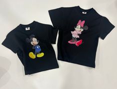 Matching Tees for the whole family! Make sure to grab the Adult sizes for Mom & Dad. Disney Items are Final Sale. Playful Black T-shirt With Character Print, Family Matching Mickey Mouse Cotton Tops, Black T-shirt With Minnie Mouse Graphic, Crew Neck, Black Minnie Mouse T-shirt Short Sleeve, Black Minnie Mouse Short Sleeve T-shirt, Playful Minnie Mouse Crew Neck Top, Fun Mickey Mouse Short Sleeve Tops, Family Matching Black Tops With Character Print, Black Family Matching Tops With Character Print