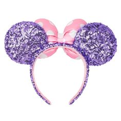 Like Minnie Mouse, you'll be a sparkling, timeless classic in this lavender sequined ear headband with signature pink and white polka dot satin bow. Soft padded Minnie Mouse ears Lavender sequined ears and headband Pink satin bow with white polka dots Contrast non-slip velour interior One size fits most Polyester, exclusive of decoration Imported ** Authentic Disney Parks merchandise. ** Disney Ears Hat, Disney Ears Headband, Headband With Bow, Minnie Ears Headband, Magic Bands, Mouse Ears Headband, Lavender Pink, Disney Shop, Minnie Mouse Ears