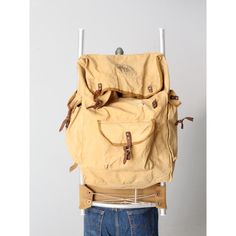 This is a 1960s vintage Boy Scouts of America backpack.  The #206 Two-Way Frame pack has a canvas bag with leather straps and multiple pockets that sets on an aluminum frame. Vintage Canvas Backpack For Outdoor Activities, Vintage Travel Backpack With Pockets, Vintage Adventure Backpack With Pockets, Vintage Canvas Backpack With Waxed Finish, Vintage Canvas Backpack For Outdoors, Vintage Waxed Finish Backpack, Vintage Travel Backpack With Leather Handles, Vintage Backpack With Canvas Lining, Vintage Waxed Canvas Backpack For Adventure