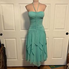 Insanely Iconic Y2k Aquamarine Bcbg Asymmetrical Handkerchief Tiered Halter Dress With A Ruched Bodice With Braided Detail Brand: Bcbg Maxazria Size: S Bust: 15 - 19 In Waist: 12 - 16 In Hip: 16 - 20 In Length: 48 In (From Center Front To Hem) Note: There Is Some Discoloration On The Inner Most Layer Of The Dress Near The Hem. It’s Covered By Other Layers And Isn’t Super Noticeable. There Is Also Some Discoloration On The Braided Portion Of The Bodice. Iconic Y2k, Ruched Bodice, Bcbgmaxazria Dresses, Aquamarine, Halter Dress, Bodice, The Dress, Colorful Dresses, Color Blue