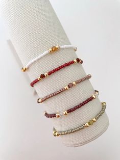 The Seed Bead Bracelet – georgia layne Everyday Heishi Beads Jewelry, Adjustable Gold Beads Stretch Bracelet For Everyday Wear, Adjustable Dainty Heishi Beads Bracelets, Elegant Heishi Bead Bracelets With Tiny Beads, Dainty Heishi Beads Bracelets With Spacer Beads, Everyday Heishi Beads Bracelet, Adjustable Spiritual Beaded Bracelets With Gold Beads, Gold And Heishi Beads Stretch Bracelet, Adjustable Spiritual Heishi Bead Bracelet