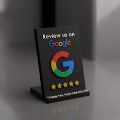 a sign that says review us on google with five stars in the bottom right corner