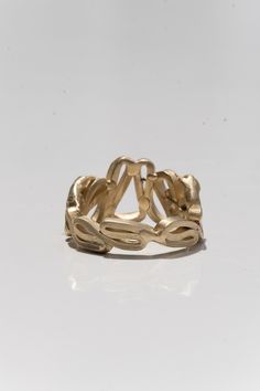 Superbly unique and finely detailed ring comprising of two carved hands holding a unique squiggle of artfully shaped ribbons of 14K gold. 14K Yellow Gold One-of-a-kind Handmade in London Hamilton Jewelry, Tidal Pool, Hands Holding, Detailed Ring, Sale Design, Fresh Water, In London, Gold Rings, Yellow Gold