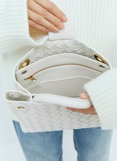 Small Andiamo handbag in intrecciato woven leather. Top handle Detachable crossbody strap Front gold-tone hardware Magnetic closure Intrecciato weave One main compartment Interior zip pocket Made in Italy 100% Leather Color: White Code: 766014 VCPP1 9156 SKU: bov0255073wht Our Products Are 100% Genuine. In All Cases We Stand By The Authenticity Of Every Product Sold On Our Site. White Luxury Everyday Bags With Handles, White Luxury Everyday Bag With Handles, White Everyday Luxury Bag With Handles, White Everyday Luxury Bags With Handles, White Shoulder Bag With Detachable Handle For Everyday Luxury, White Intrecciato Weave Bag For Travel, White Intrecciato Weave Travel Bag, Luxury White Shoulder Bag With Intrecciato Weave, Luxury Satchel With Intrecciato Weave As Shoulder Bag