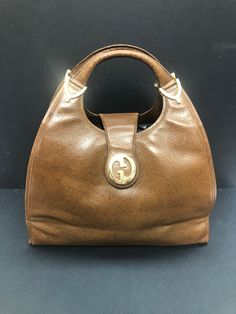 Gucci Vintage  1970 Brown Leather Stirrup hobo Shoulder Bag 12 x 9 x 5 inch  Zip compartment inside £425.00 Gucci Vintage Bag, Gucci Vintage, Hobo Shoulder Bag, Vintage Bag, Stirrups, Vintage Bags, Vintage Gucci, Purses And Handbags, Shoulder Bags