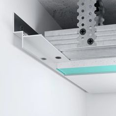 the underside of a ceiling fixture in a white room