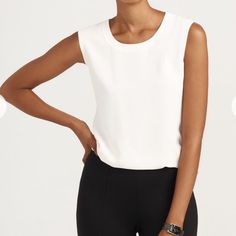 A Wardrobe Essential, This Scoop Neck Tank Is Perfect Anywhere, From Office Layering To Casual Weekends. Anne Klein’s Version Of A Seasonless White, “Anne White” Compliments A Variety Of Skin Tones Depicting A Soft Cream Hue. Scoop Neck Tank Top For Spring Workwear, Elegant Scoop Neck Tank Top For Everyday, Casual Scoop Neck Tank Top For Work, Elegant White Scoop Neck Tank Top, Versatile White Tank Top For Work, White Stretch Tops For Business Casual, Classic Scoop Neck Top For Workwear, Classic Scoop Neck Top For Work, Solid Scoop Neck Top For Work