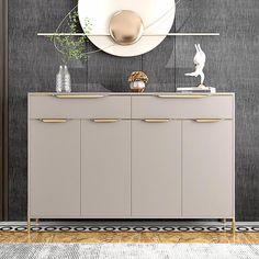 a modern sideboard with two drawers and a round mirror on the wall