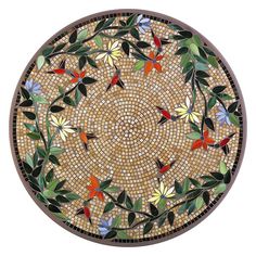 a circular mosaic design with leaves and flowers on the center is shown in brown tones