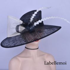 Large brim sinamay hat with bow&feathers Brim width:19.5cm in the biggest part Head size: 57cm also with elastic to adjust it to be smaller Ideal for wedding/party/races/church Every hat is well inspected before shipment,we don't accept return.Please check our terms carefully before placing order,thanks for your supports. Formal Top Hat With Feathers For Royal Ascot, Feathered Top Hat For Royal Ascot And Formal Occasions, Evening Top Hat With Feathers And Short Brim, Formal Feathered Top Hat For Royal Ascot, Black Boater Hat For Royal Ascot Party, Evening Top Hat With Feathers For Kentucky Derby, Black Sinamay Fascinator For Kentucky Derby, Elegant Top Hat For Kentucky Derby Ceremony, Black Sinamay Fascinator For Wedding