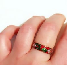 Red cloisonne ring. New without use. This is a vintage cloisonne ring. It is a  White color and has a gorgeous pink and green flower & leaf design. Made in the 1970s. I have in more colors any questions do not hesitate to ask The rings are delivered with a jewelry box.  Combined shipping! Flower-shaped Enamel Ring As Gift, Flower-shaped Enamel Ring For Gift, Floral Enamel Ring As Gift, Flower Shaped Enamel Ring For Gift, Flower Shaped Enamel Ring As A Gift, Pink Flower Enamel Ring For Gift, Vintage Enamel Flower Ring For Gift, Flower Cherry Blossom, Flower Leaf