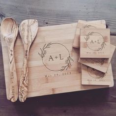 personalized wooden cutting board with utensils and coasters for guests to use