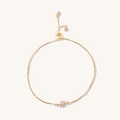 We love this dainty cutie! How precious is our little crystal star bracelet? It may look small, but this adjustable accessory is sure to be your biggest hit. 14k gold plated over copper This bracelet has an adjustable sliding bead that will make the bracelet tighter or looser-making it fit any size wrist! Adjustable Yellow Gold Star Bracelet, Everyday Star Charm Bracelet, Dainty Cubic Zirconia Jewelry With Star Charm, Adjustable Delicate Jewelry With Star Charm, Dainty Adjustable Yellow Gold Charm Bracelet, Gold Plated Star-shaped Jewelry With Adjustable Chain, Gold-plated Star-shaped Jewelry With Adjustable Chain, Gold Plated Star Jewelry With Adjustable Chain, Adjustable Rose Gold Charm Bracelet For Everyday