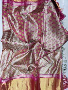 ❥ Saree & Stitched Blouse. ❥ Size 36-40 ❥ Dry Wash Only ; ❀❀ Return / Exchange Policy : ※ No Return/ No Exchange / No Cancellation! ※We need proof of video while package is opening for considering any case of missing or damaged products ; ※ We can not accept any returns , if video at the time of package opening is not provided by the client . ღ ღ Please be courteous and don't ask for negotiation on prices ! We define prices based on material & efforts involved to deliver this high quality produc Festive Banarasi Silk Pre-draped Saree With Self Design, Semi-stitched Paithani Silk Dupatta For Puja, Semi-stitched Paithani Silk Saree For Wedding, Festive Katan Silk Pre-draped Saree With Dupatta, Katan Silk Pre-draped Saree For Wedding And Diwali, Eid Art Silk Pre-draped Saree With Pallu, Navratri Tussar Silk Churidar With Pallu, Gold Banarasi Silk Lehenga For Diwali, Bollywood Style Tussar Silk Churidar For Diwali