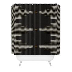 a black and white shower curtain with lines on the bottom, in front of a white background