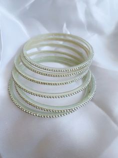 Indian white bangles size 2.6. White Stackable Bangle, White Stackable Bracelets For Party, White Round Bracelets For Party, Adjustable White Bangle, White Saree, The Bangles, Gold Plated Bangles, Bangle Set, Size 2