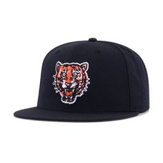 a tiger head embroidered on the side of a black hat